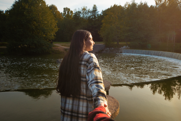 A person confidently embracing their authentic personality through personal growth, self-discovery, and aligning with their values